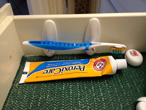 Ganchos para guardar el cepillo de dientes